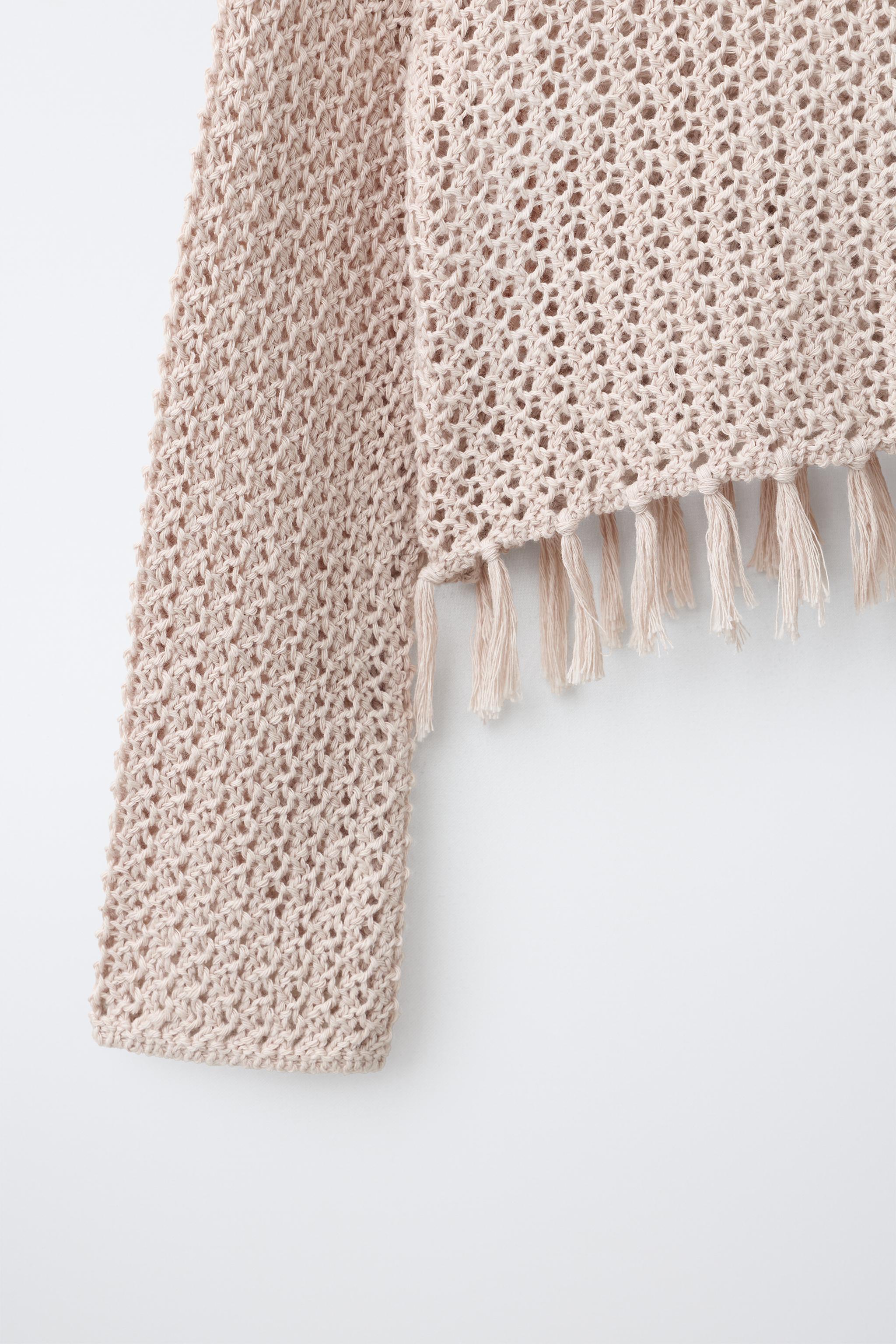 PULL EN MAILLE À FRANGES
